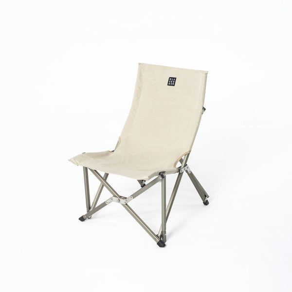 Lahek zložljiv stol Otaku – topla bela